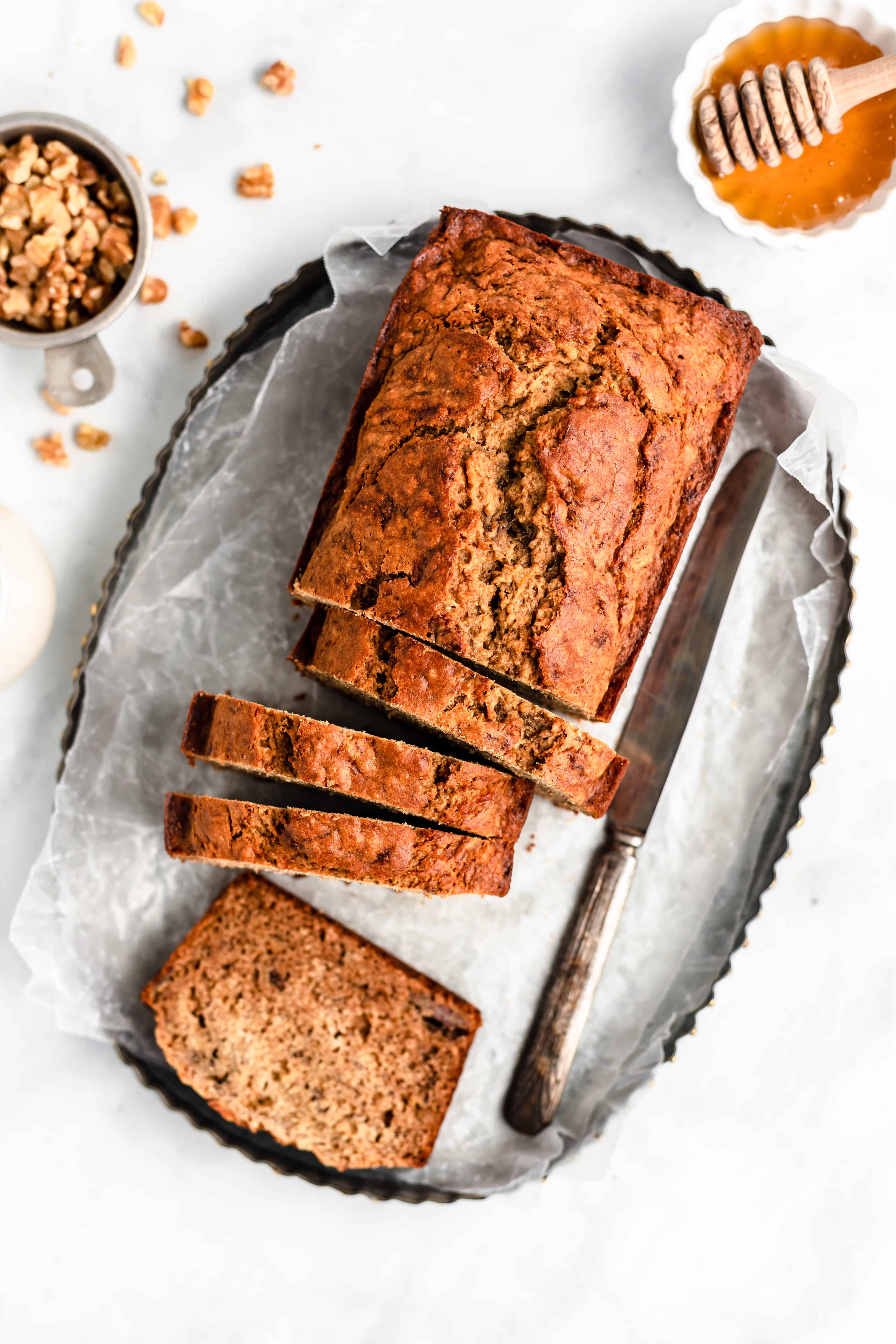 Moist and lightly sweetened Healthy Banana Bread – made with bananas, coconut oil, cinnamon, and whole wheat flour.