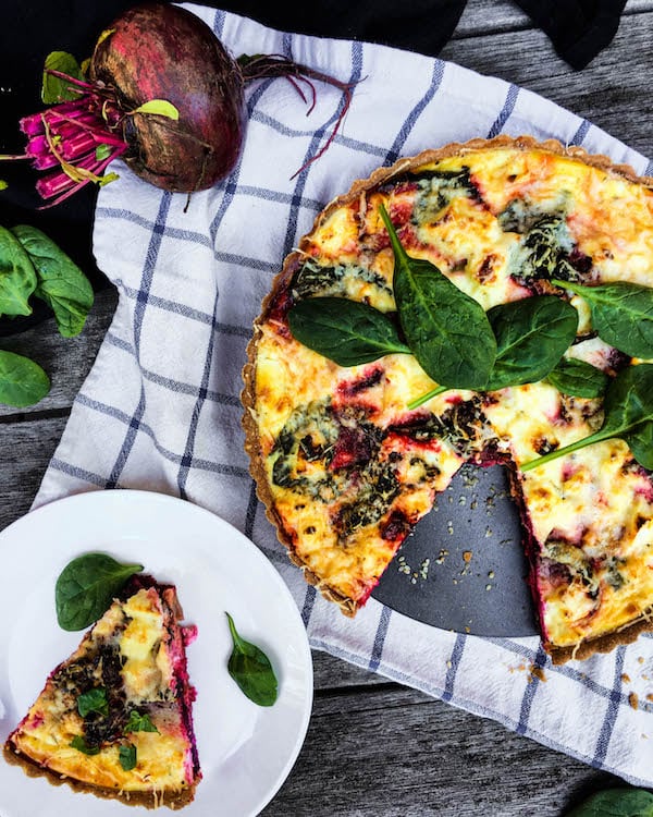 So delicious and easy to make, this Roasted Beet, Spinach, and Goat Cheese Quiche makes a great brunch or even dinner!