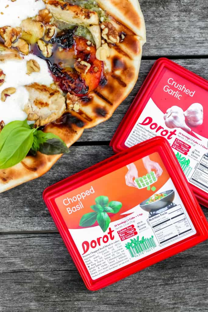 Grilled Pesto Chicken, Peach, and Burrata Flatbread is easy and delicious with the help of Dorot - the perfect way to use your grill this summer!