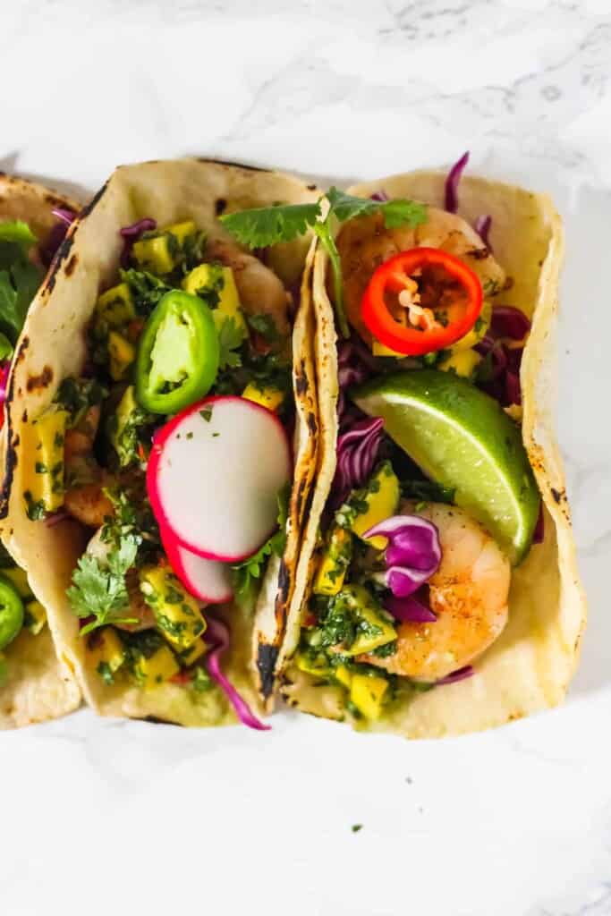 Grilled Shrimp Tacos with Mango Chimichurri - simple, healthy, and full of flavor! #tacos