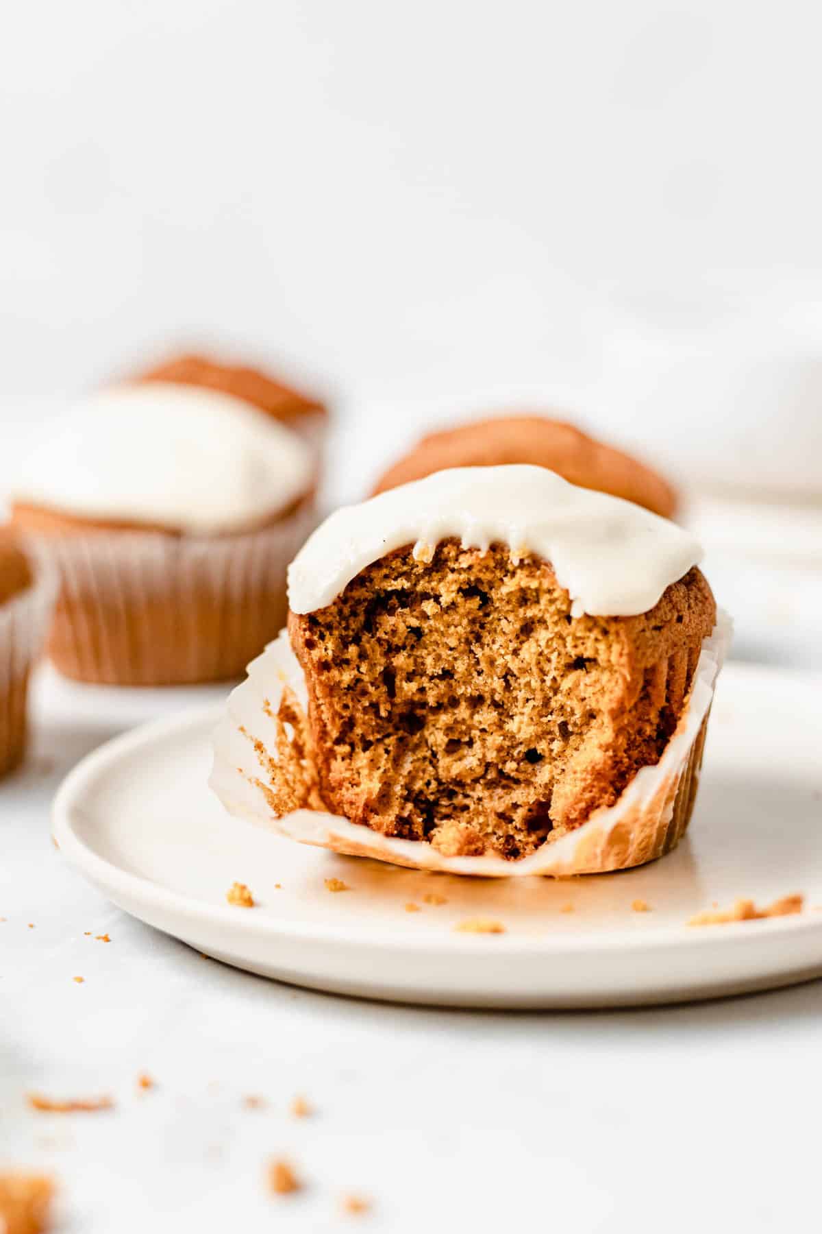Bakery Style Pumpkin Muffins with Maple Glaze