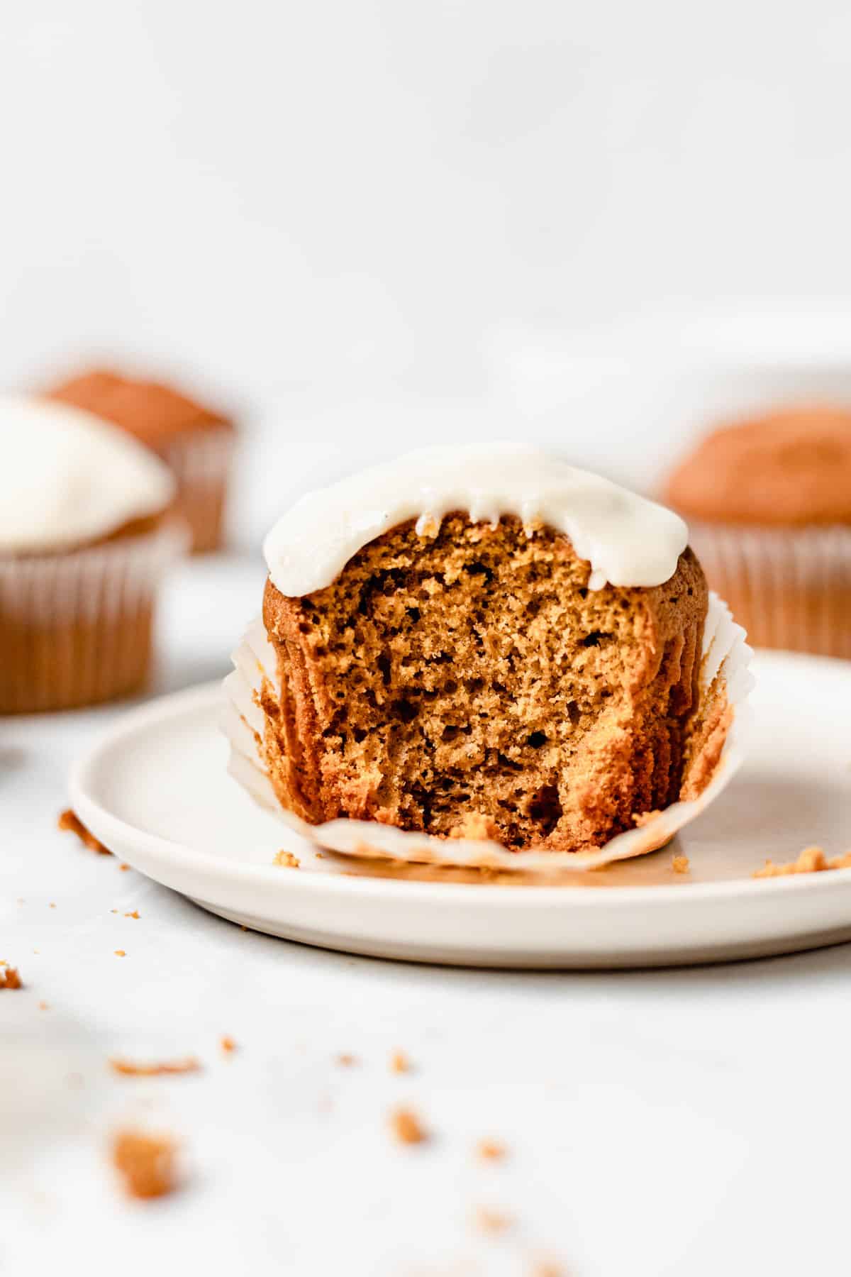 moist pumpkin muffin with maple glaze