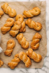 koulourakia on brown parchment paper.