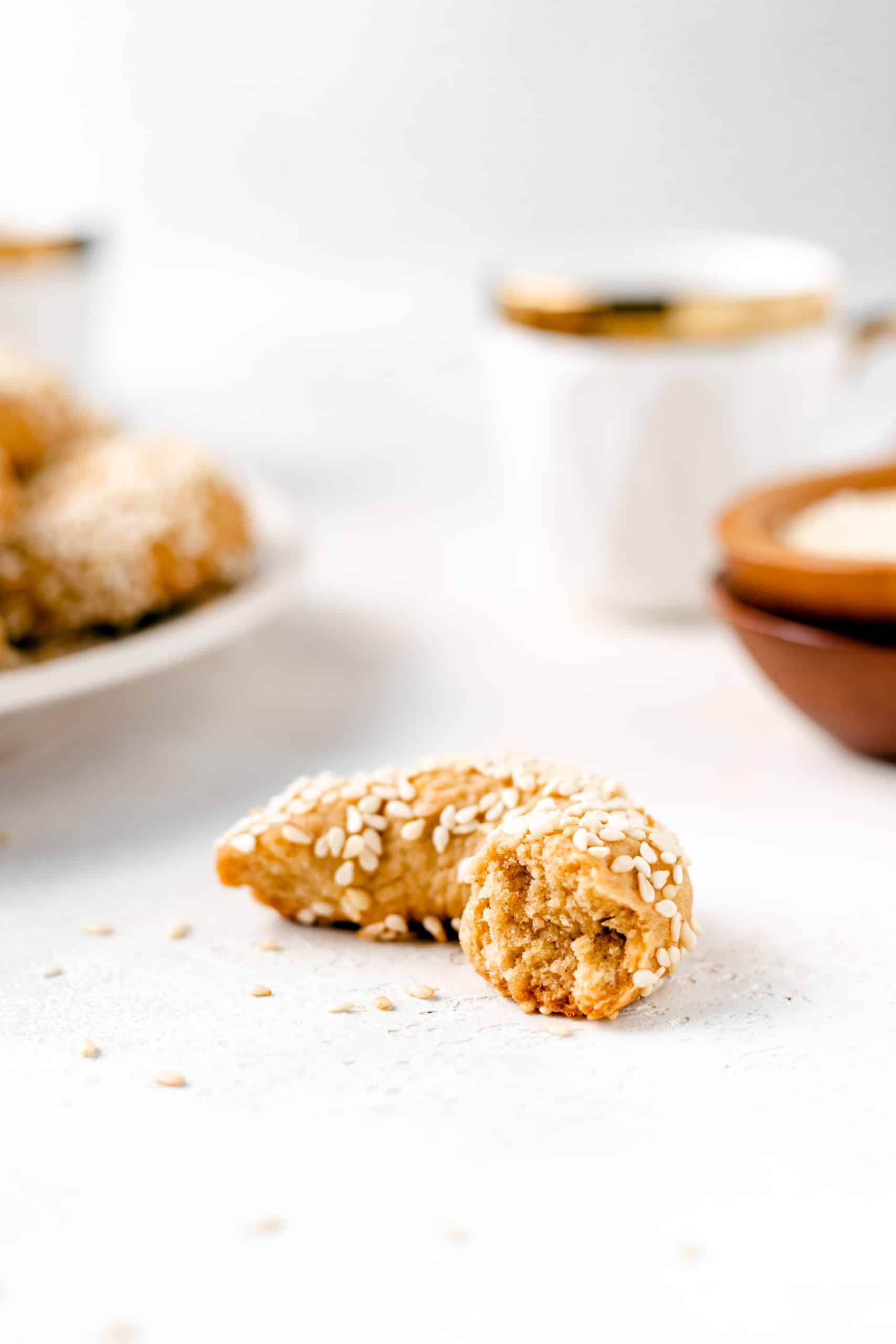 greek olive oil and sesame seed cookie cut in half