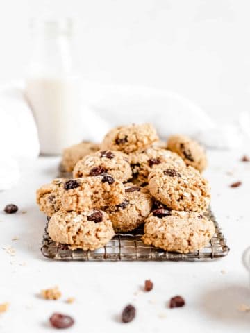 These Healthy Chewy Gluten Free Oatmeal Raisin Cookies are the best ever! They’re incredibly soft, chewy, and perfectly spiced with a hint of cinnamon. (refined sugar-free, vegan)
