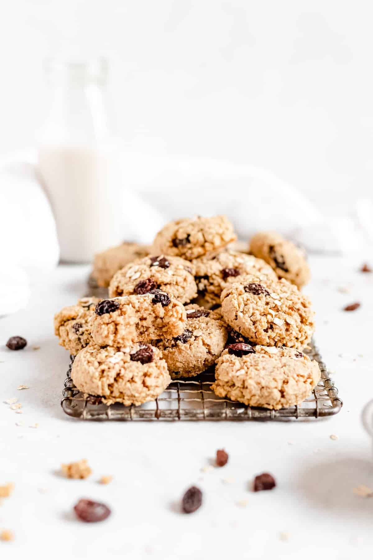 These Healthy Chewy Gluten Free Oatmeal Raisin Cookies are the best ever! They’re incredibly soft, chewy, and perfectly spiced with a hint of cinnamon. #vegan #glutenfree #oatmealraisin #cookies #healthycookies #almondflour #bakedambrosia