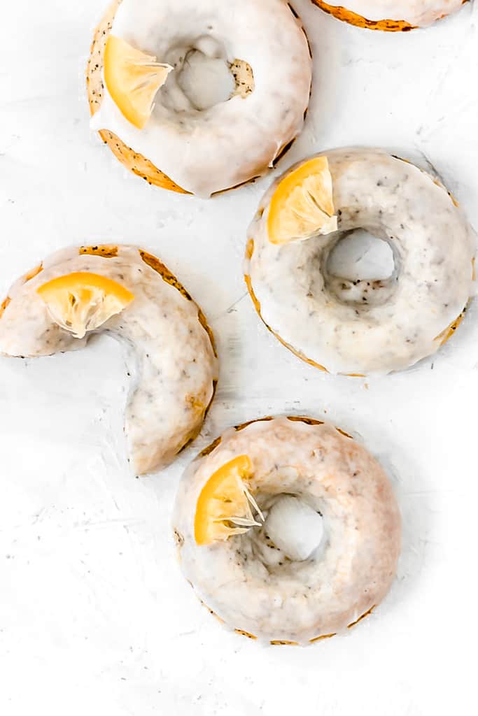 These 20 minute Baked Lemon Poppy Seed Donuts are soft, fluffy, and bursting with fresh lemon flavor and poppy seeds! (gluten free, Paleo, with a vegan option)