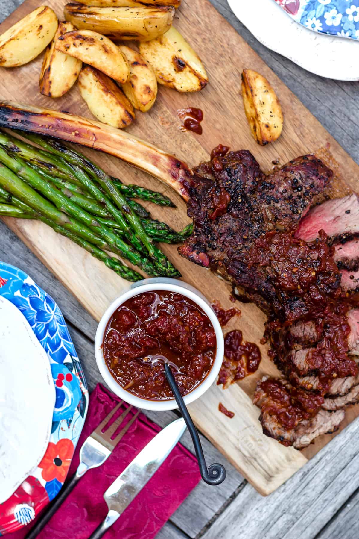 Grilled Black Peppercorn Tomahawk Ribeye with Spicy Barbecue Relish