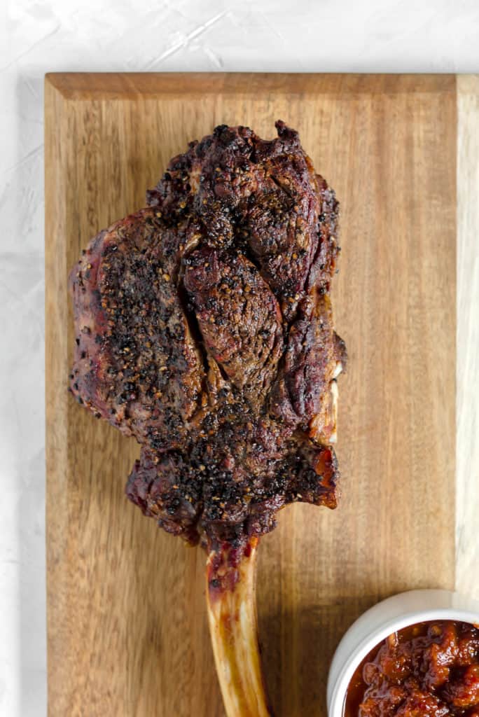 Grilled Black Peppercorn Tomahawk Ribeye with Spicy Barbecue Relish