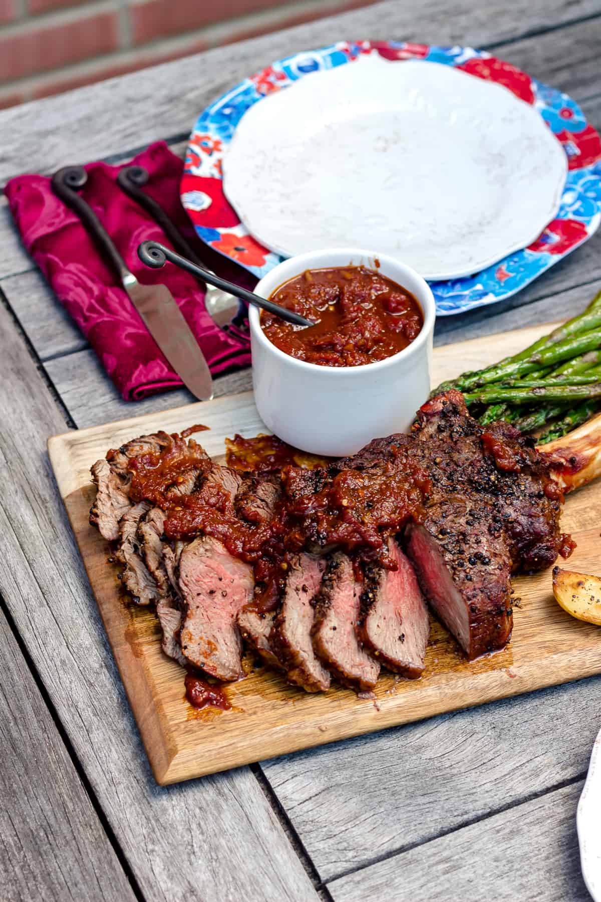 Grilled Black Peppercorn Tomahawk Ribeye with Spicy Barbecue Relish