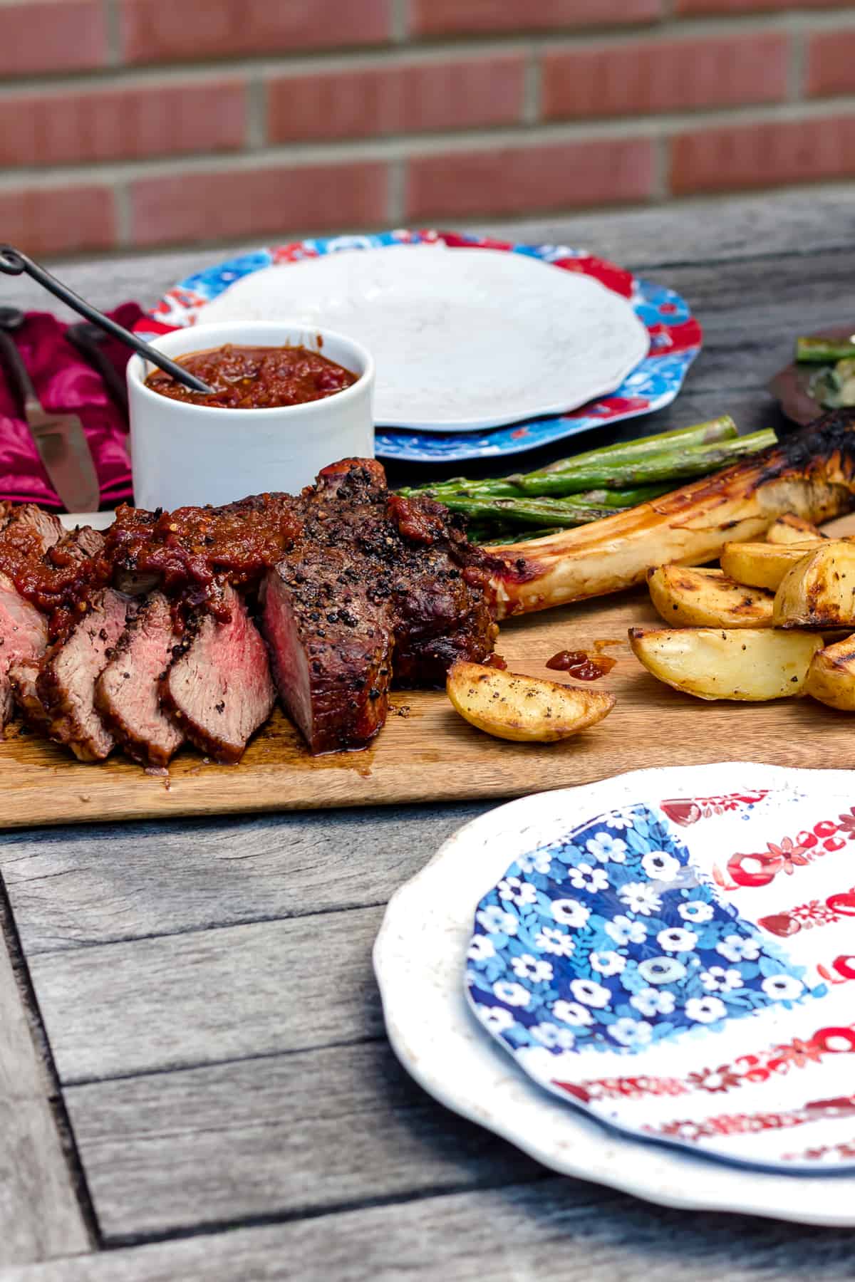 Grilled Black Peppercorn Tomahawk Ribeye with Spicy Barbecue Relish