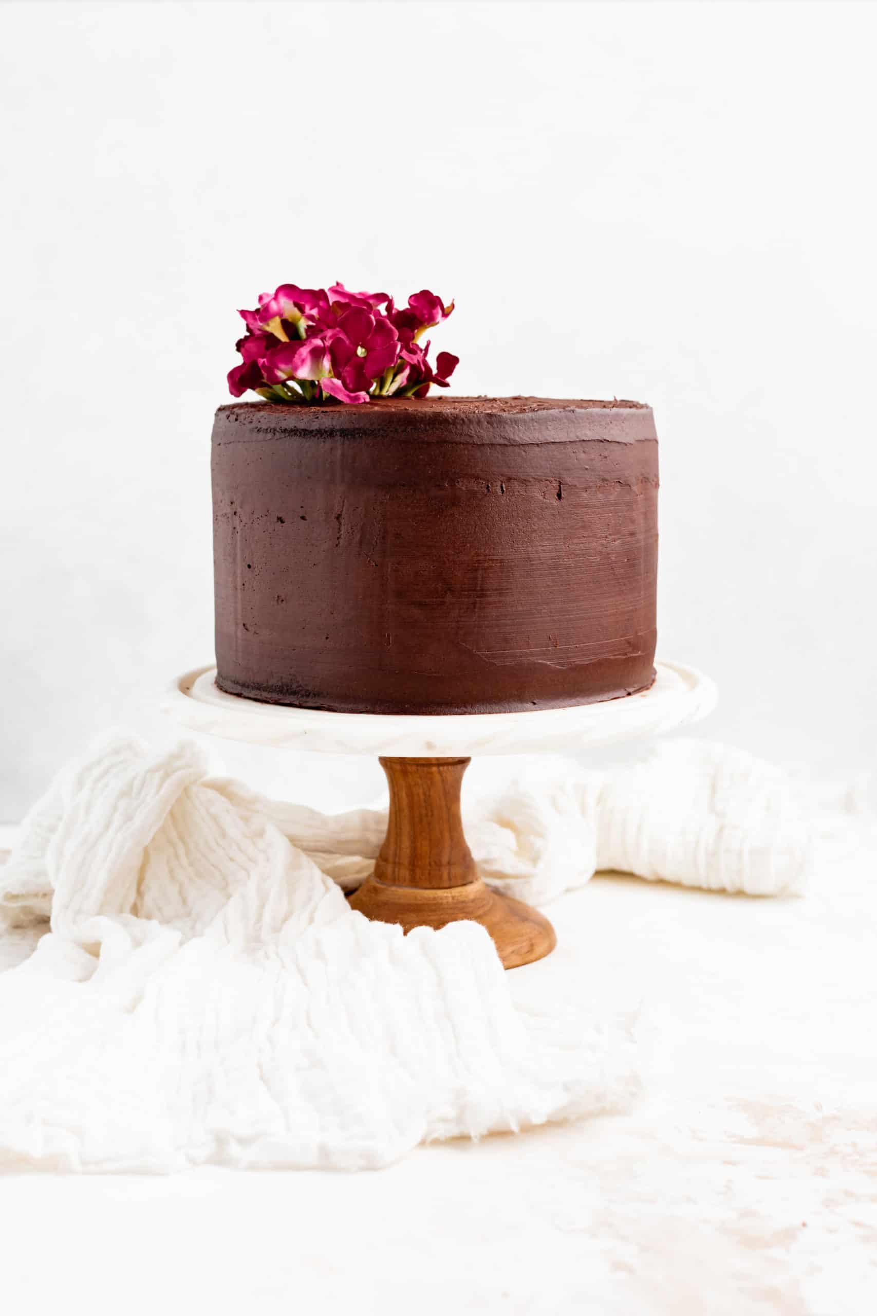 red wine chocolate cake on cake stand