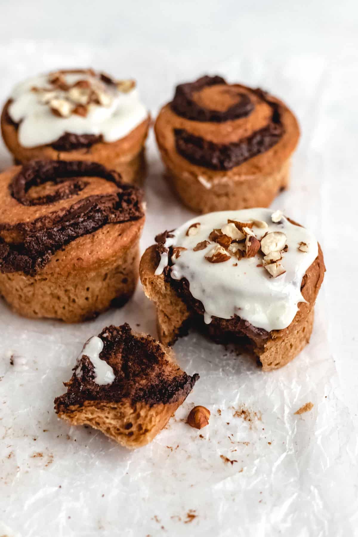 The best ever Chocolate Hazelnut Rolls - soft and delicious chocolate rolls filled with creamy chocolate hazelnut spread and topped with cream cheese icing.
