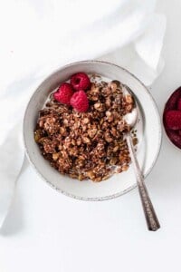 Homemade superfood chocolate espresso granola will be your new go-to breakfast or snack. This crunchy naturally sweetened granola is addicting, delicious, and nutritious.