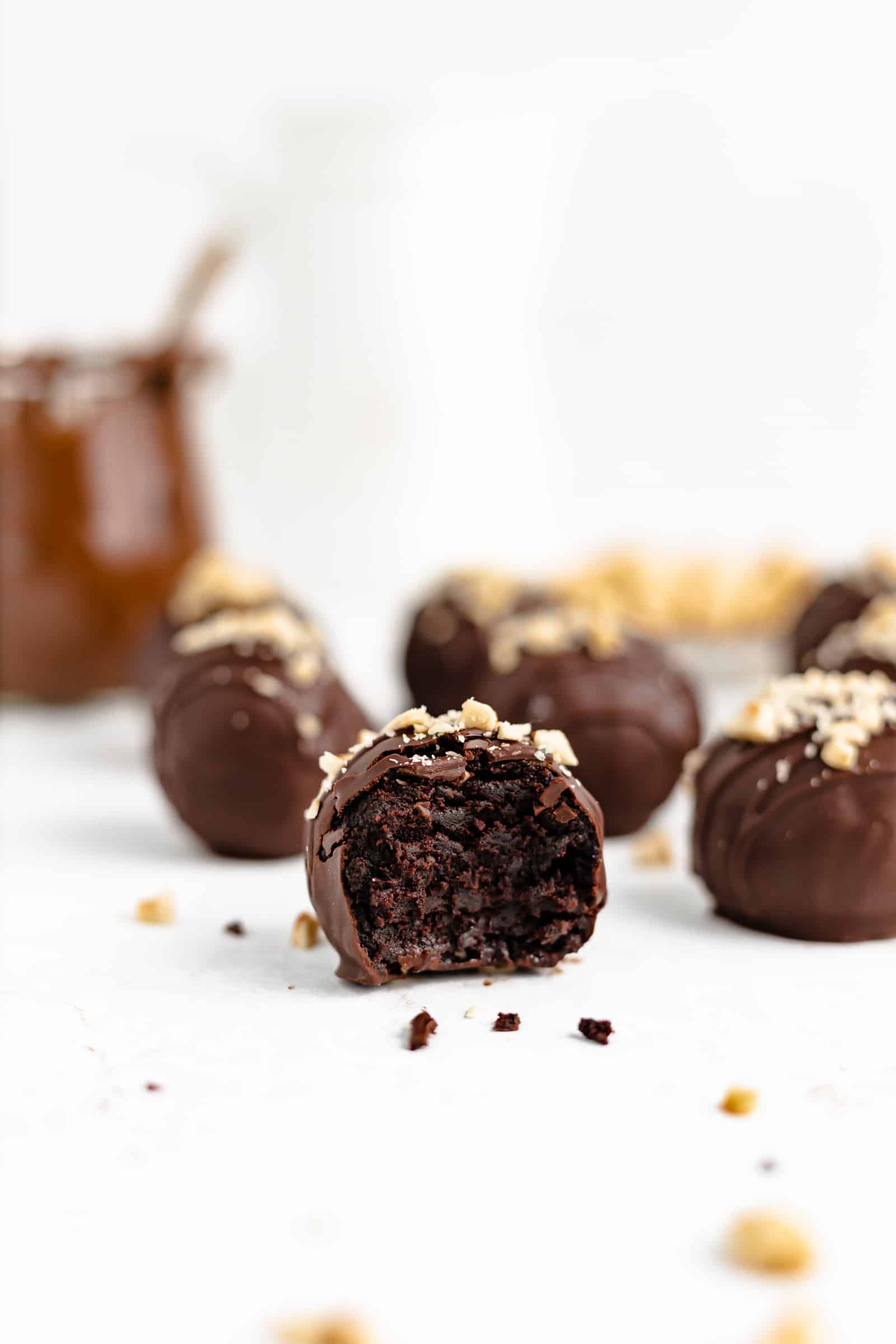 Creamy chocolate hazelnut spread mixed with cake crumbs and chopped hazelnuts, then dipped in melted dark chocolate - the ultimate chocolate treat!