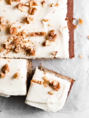 One-bowl Banana Nut Cake is an easy one layer moist cake loaded with ripe bananas and topped with a simple cream cheese frosting.