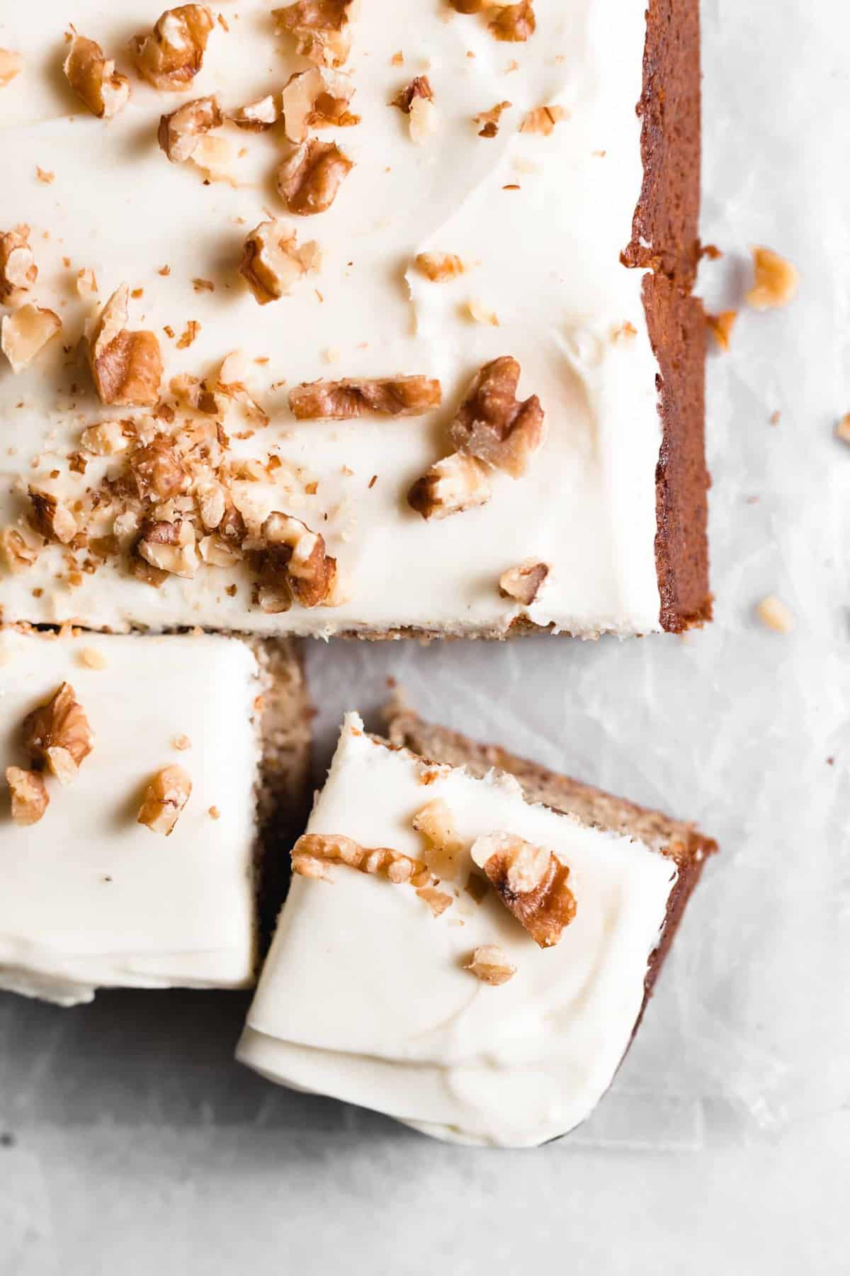 One-bowl Banana Nut Cake is an easy one layer moist cake loaded with ripe bananas and topped with a simple cream cheese frosting.