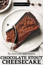A slice of chocolate cheesecake with ganache on a plate.