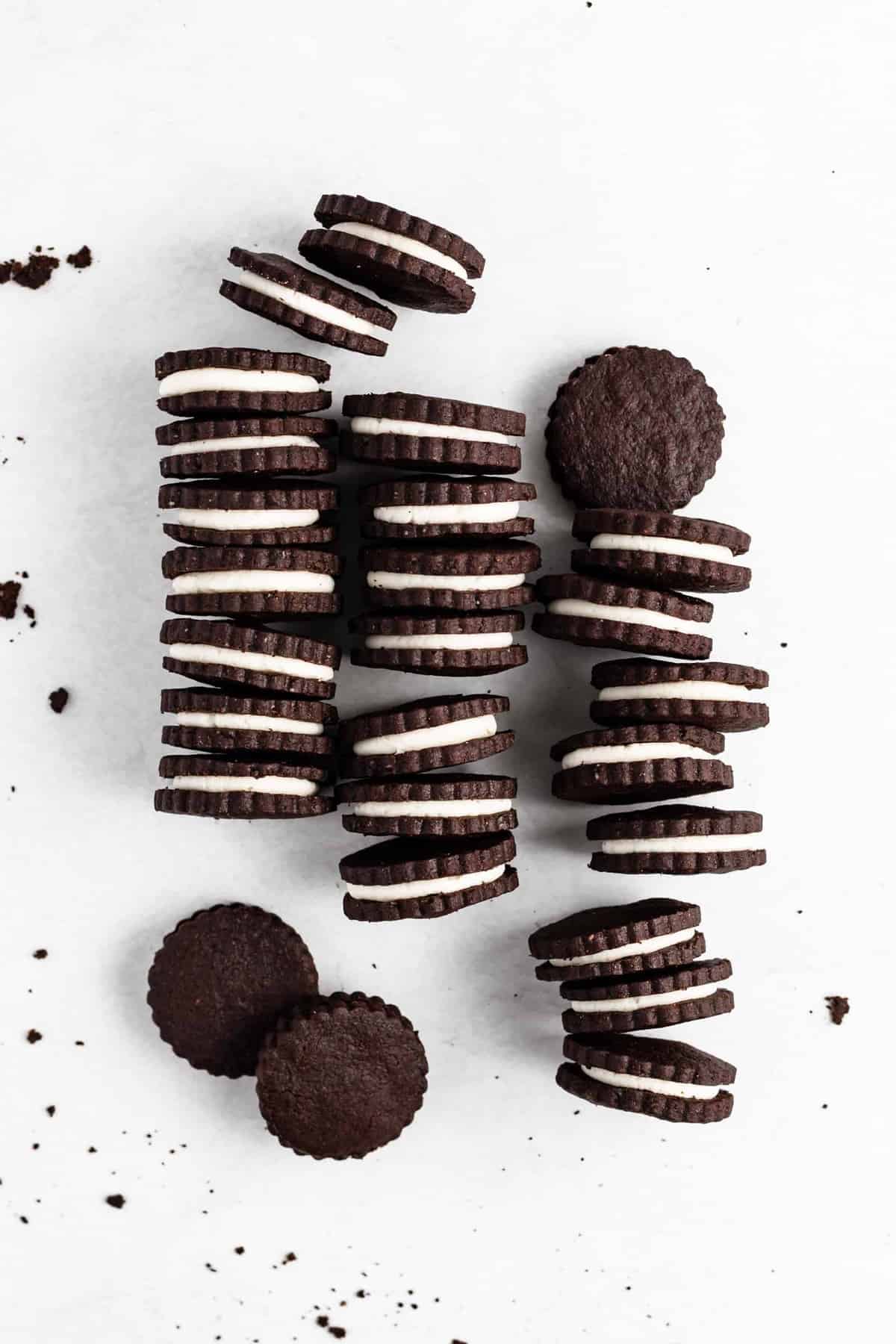 An easy and delicious gourmet version of everyone's favorite childhood treat - Homemade Oreo Cookies are crisp chocolate cookies with a cream-filled center.