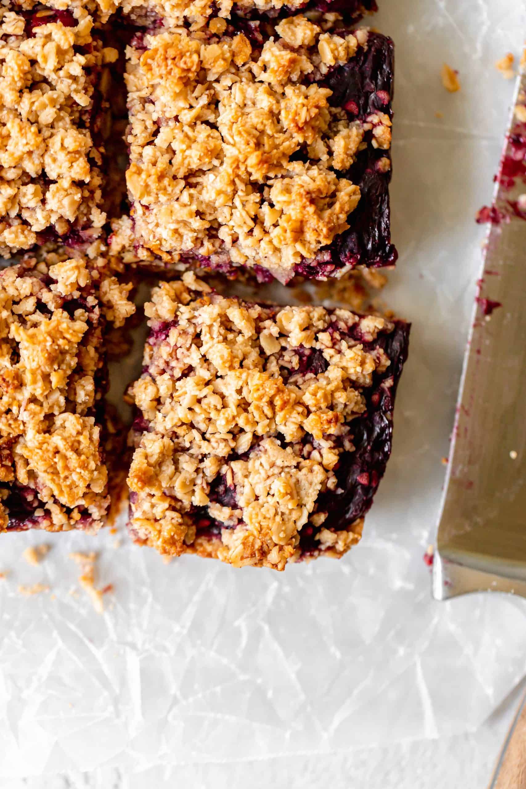 Healthy blackberry crumble bar on parchment paper