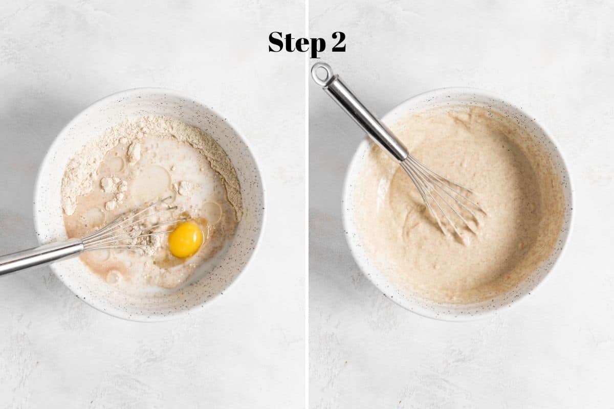 pancake batter in a mixing bowl with a whisk.