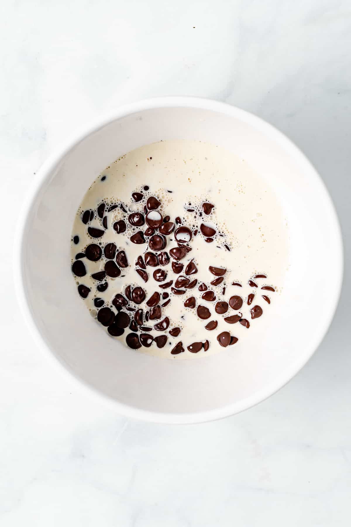 chocolate chips with cream in a bowl