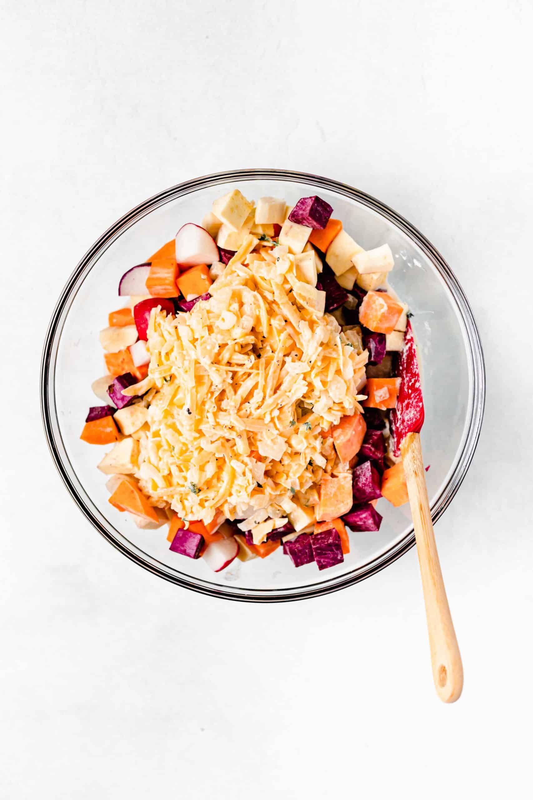 root vegetables with cheese in bowl