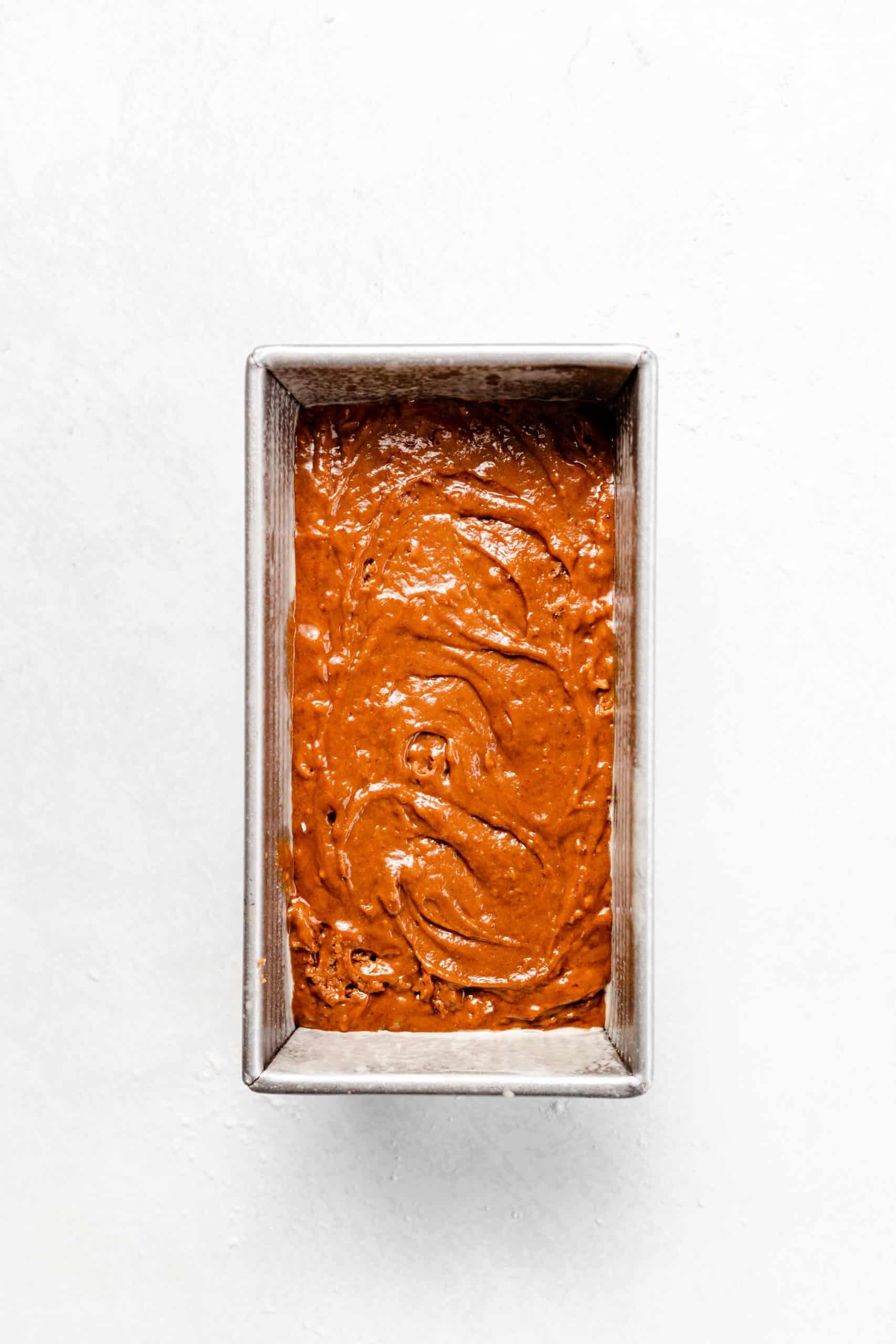 gingerbread batter in baking pan