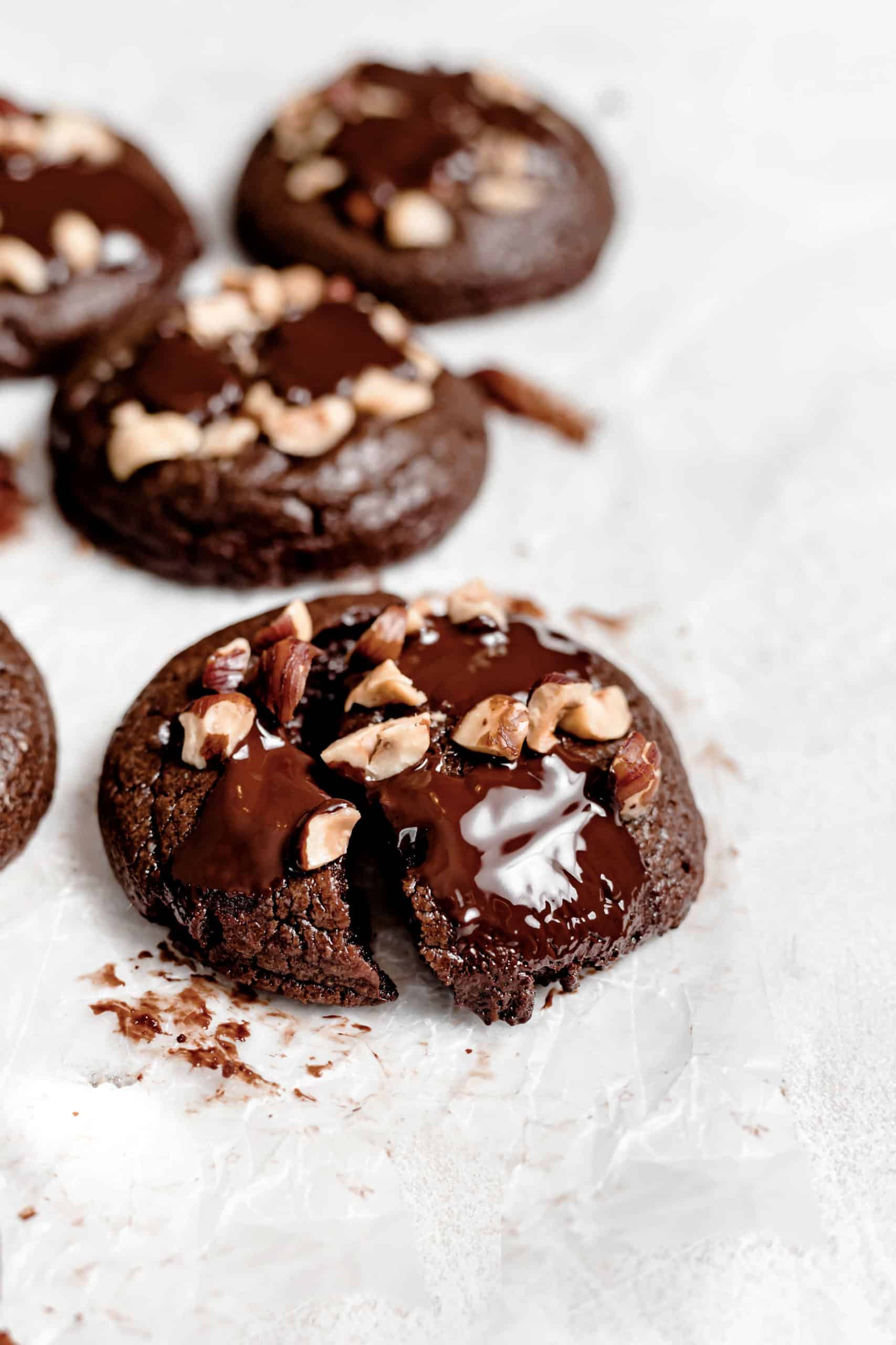 fudgy chocolate hazelnut brownie cookie cut in half