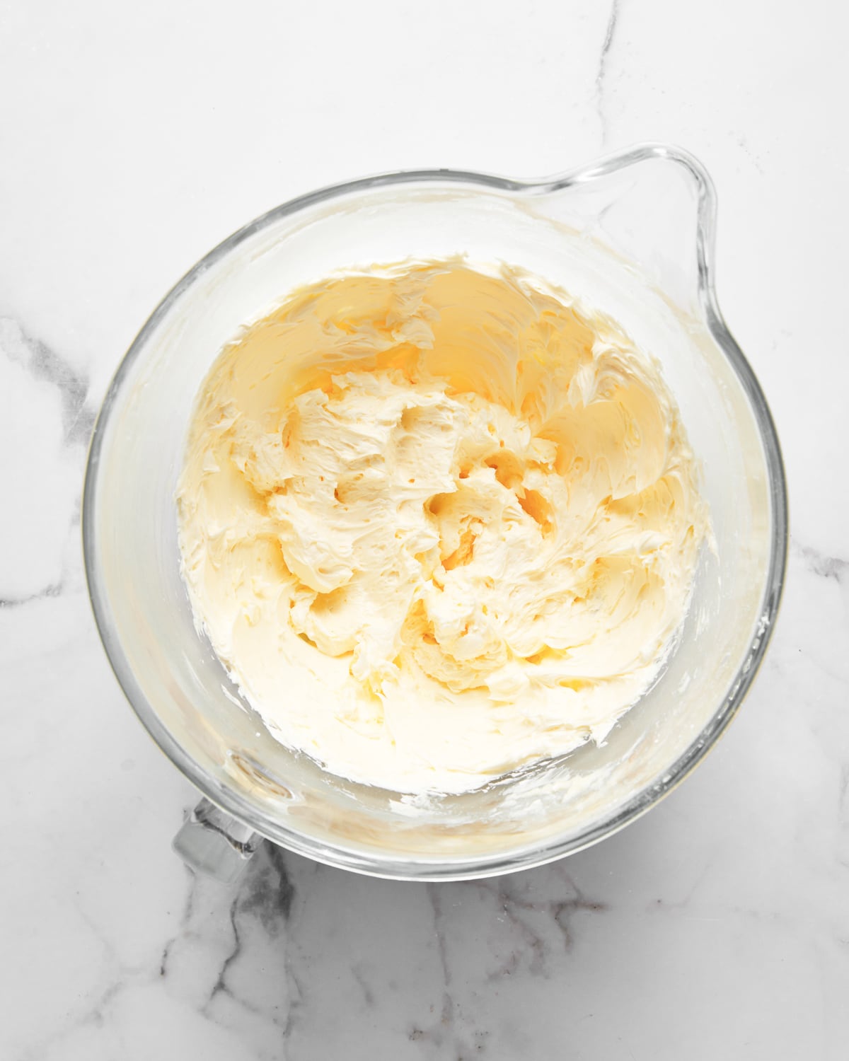 creamed butter in a mixing bowl.
