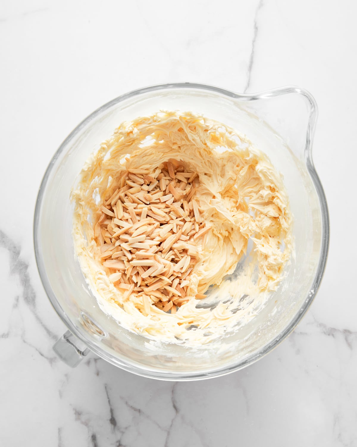 kourabiedes cookie dough in a mixing bowl.