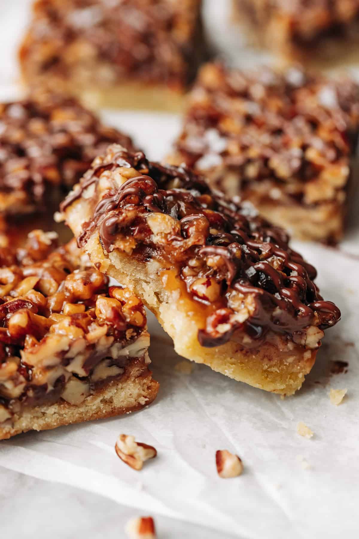 chocolate drizzled pecan pie bar.