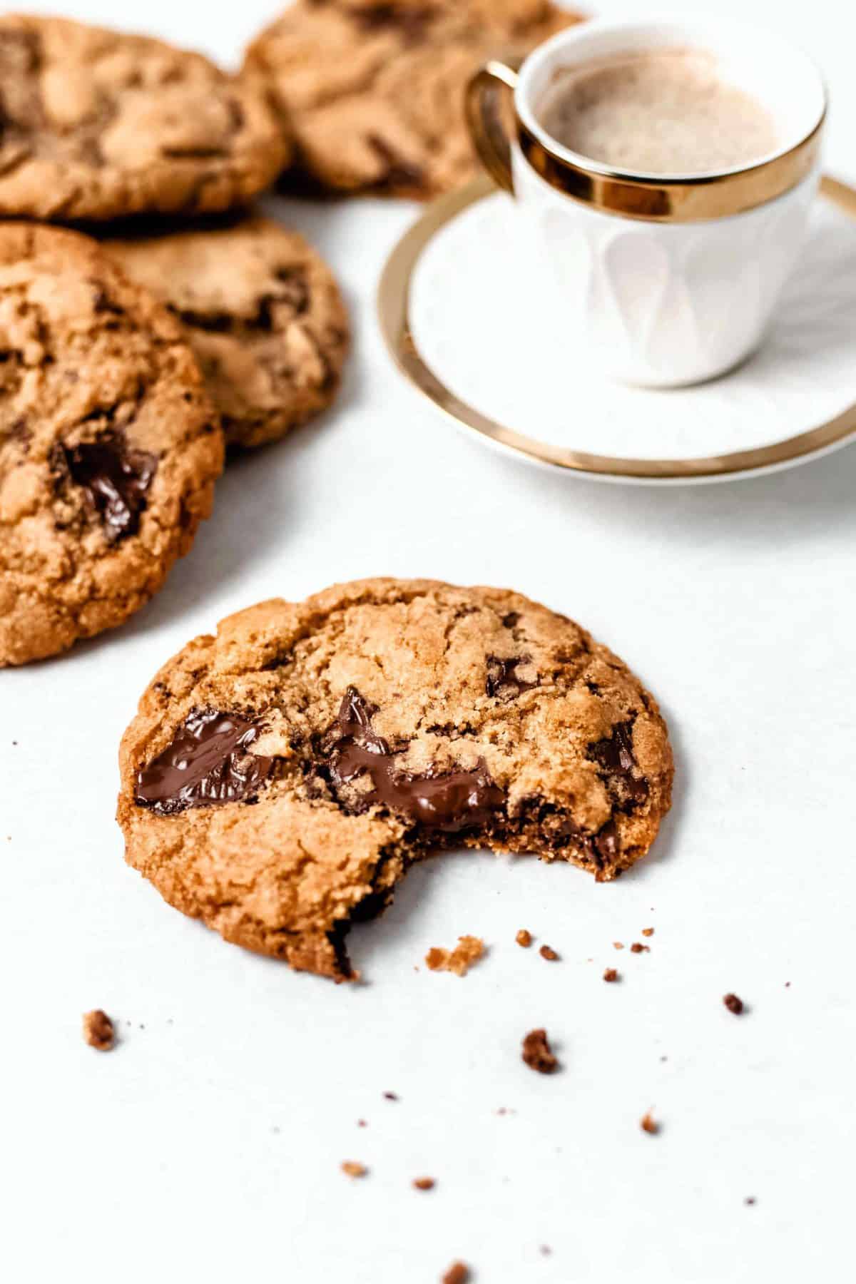 chocolate chip cookie with cup of espresso