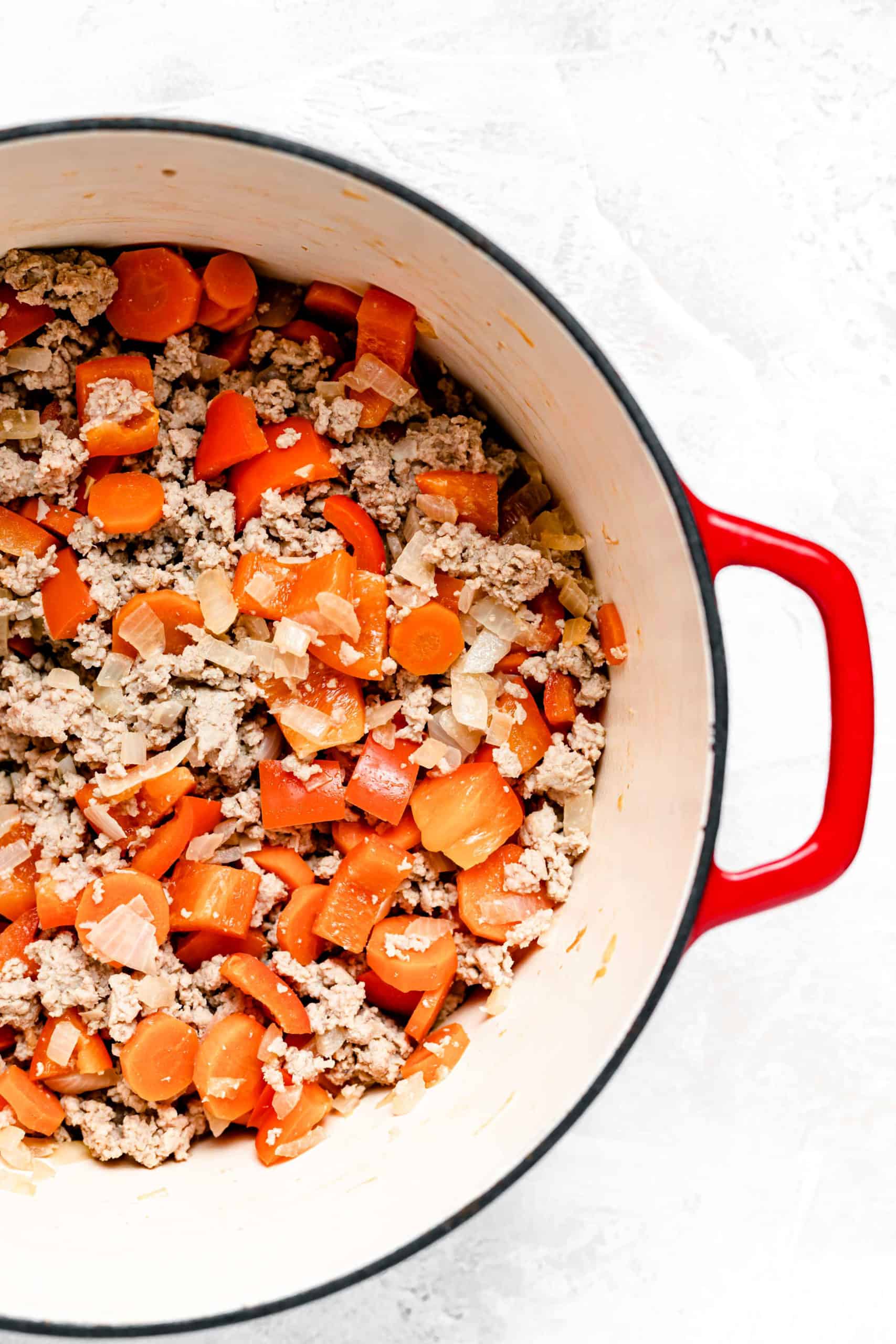 ground turkey and vegetables in pot