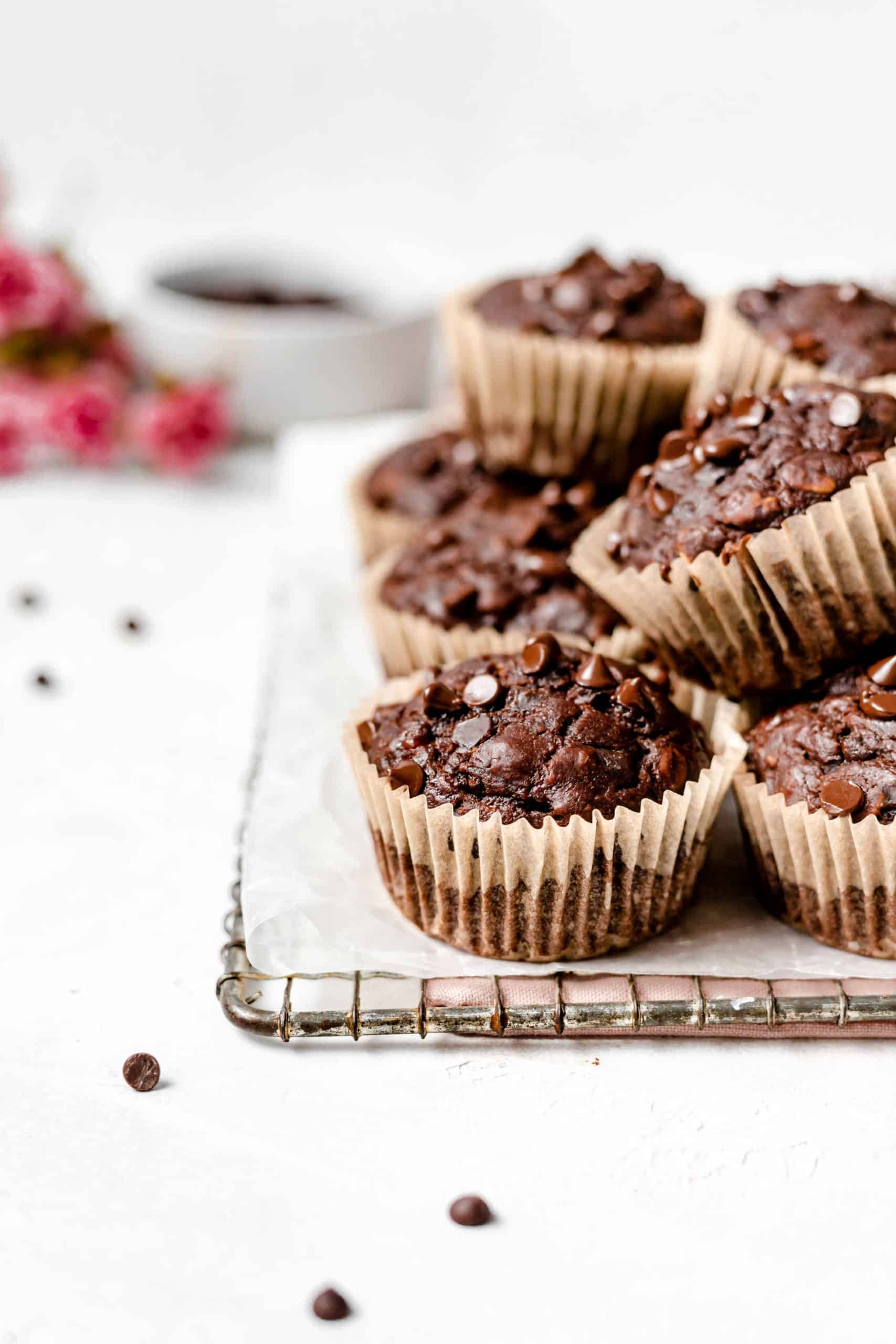 chocolate peanut butter banana muffins on a wire rack