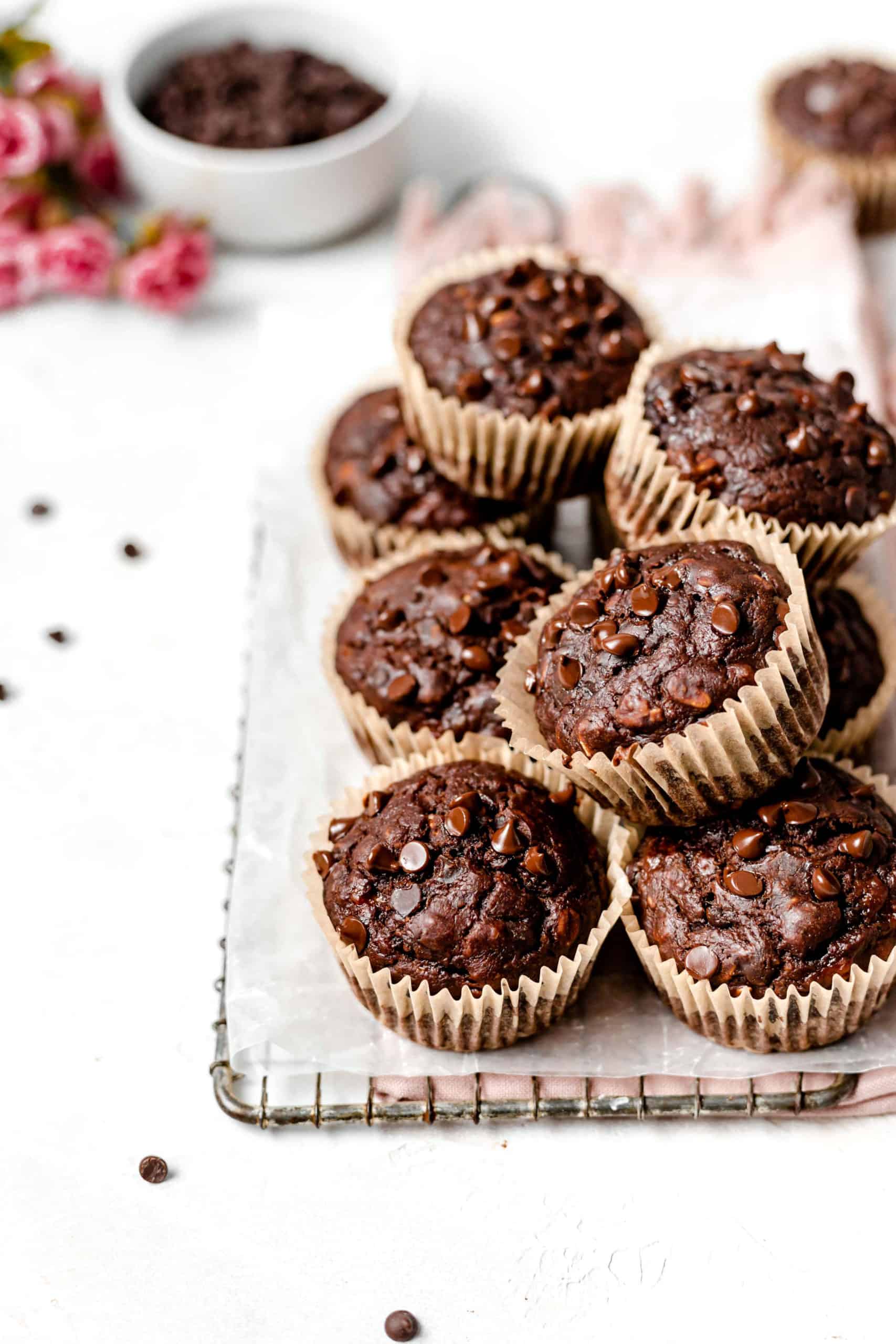 chocolate peanut butter banana muffins on a wire rack