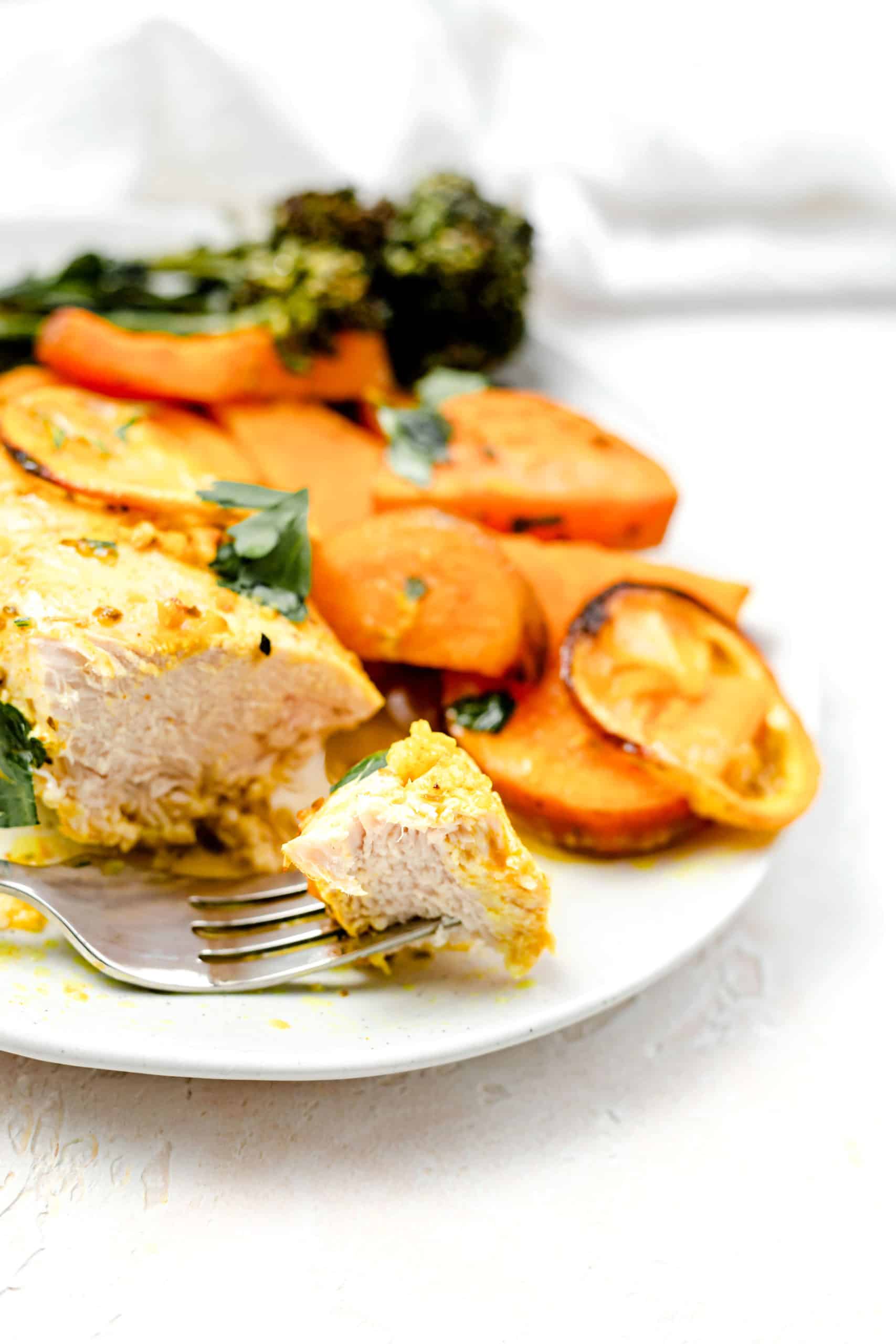 chicken and sweet potatoes on a plate