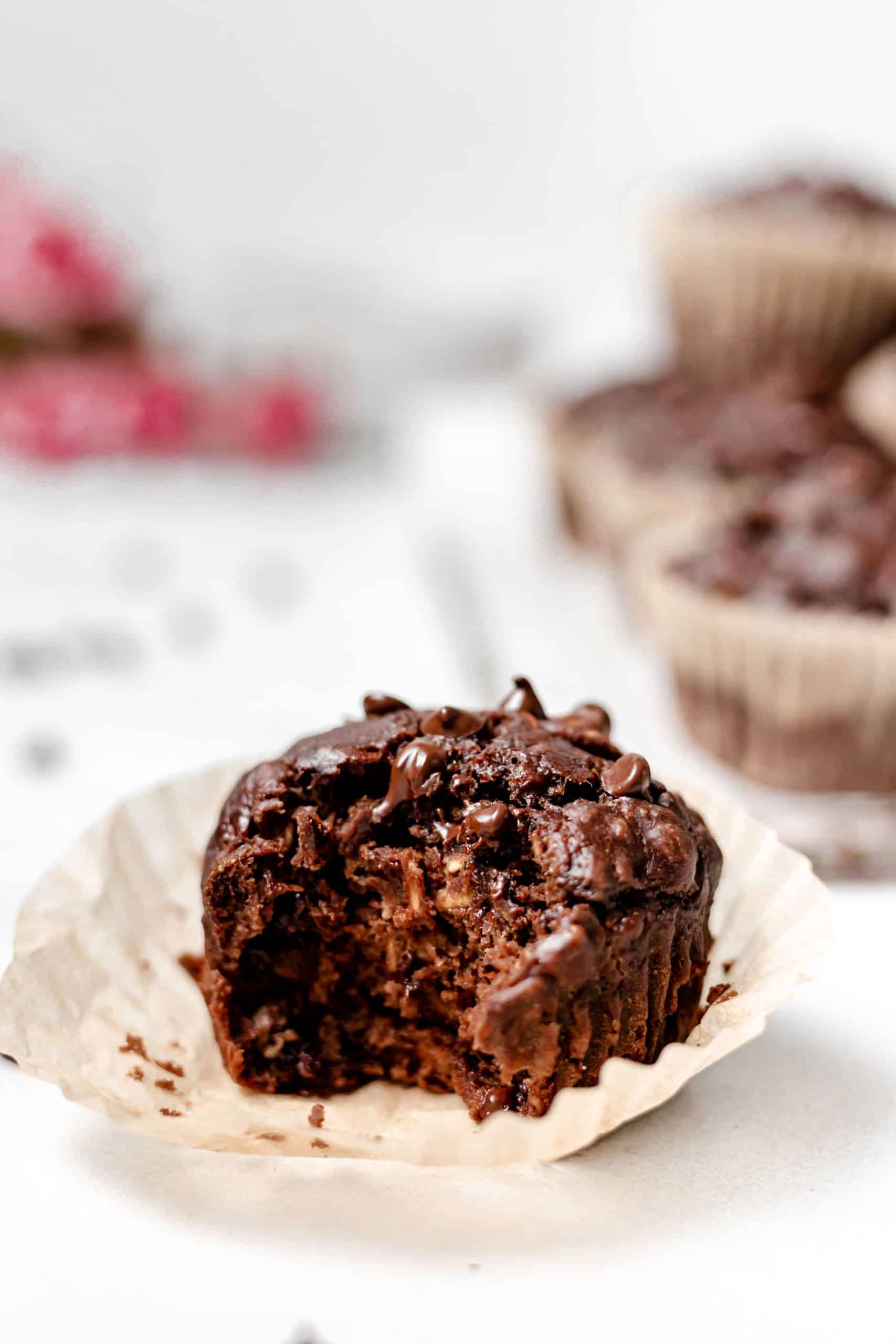 chocolate peanut butter banana muffin with a bite taken out of it