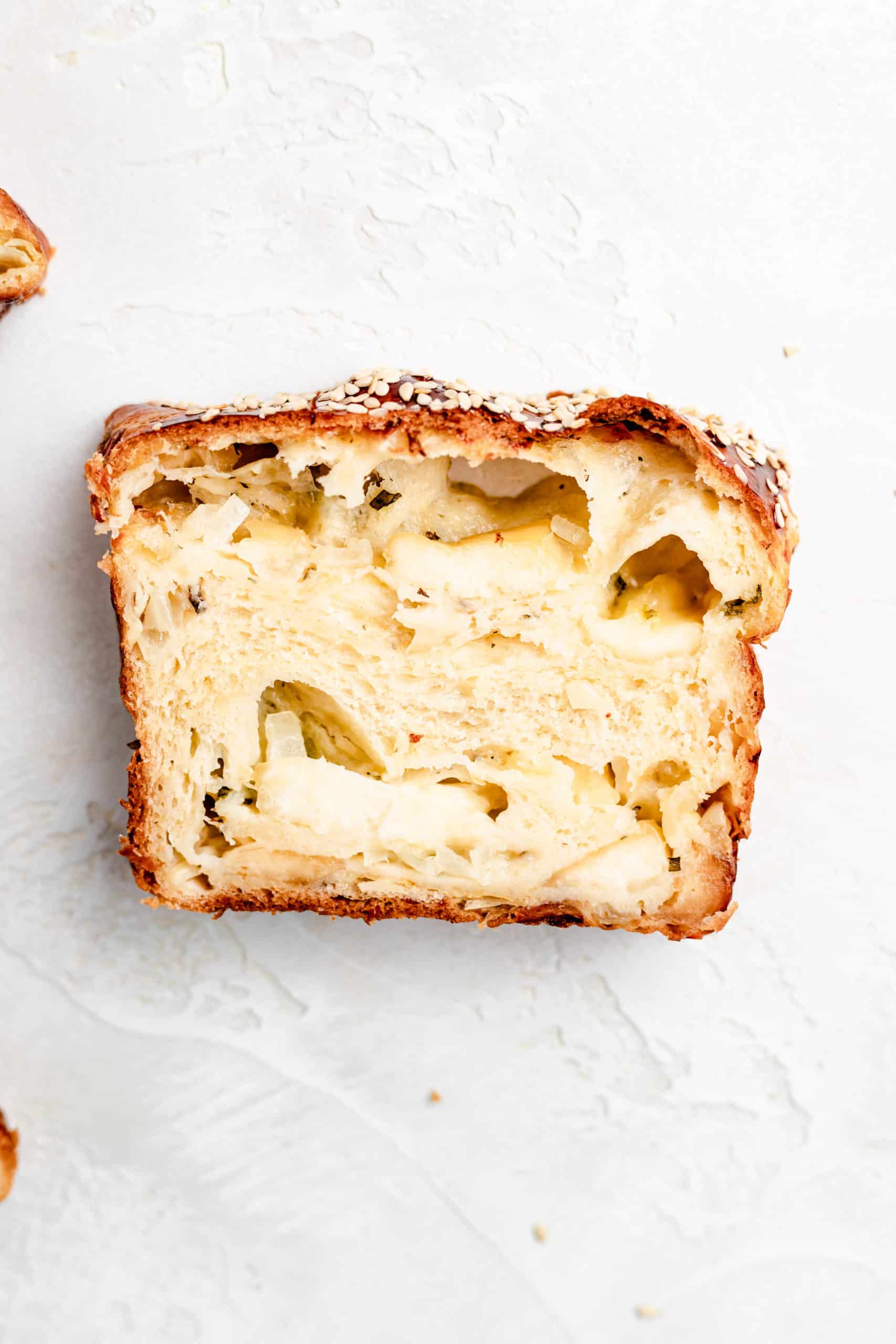 slice of halloumi, mint, and onion bread