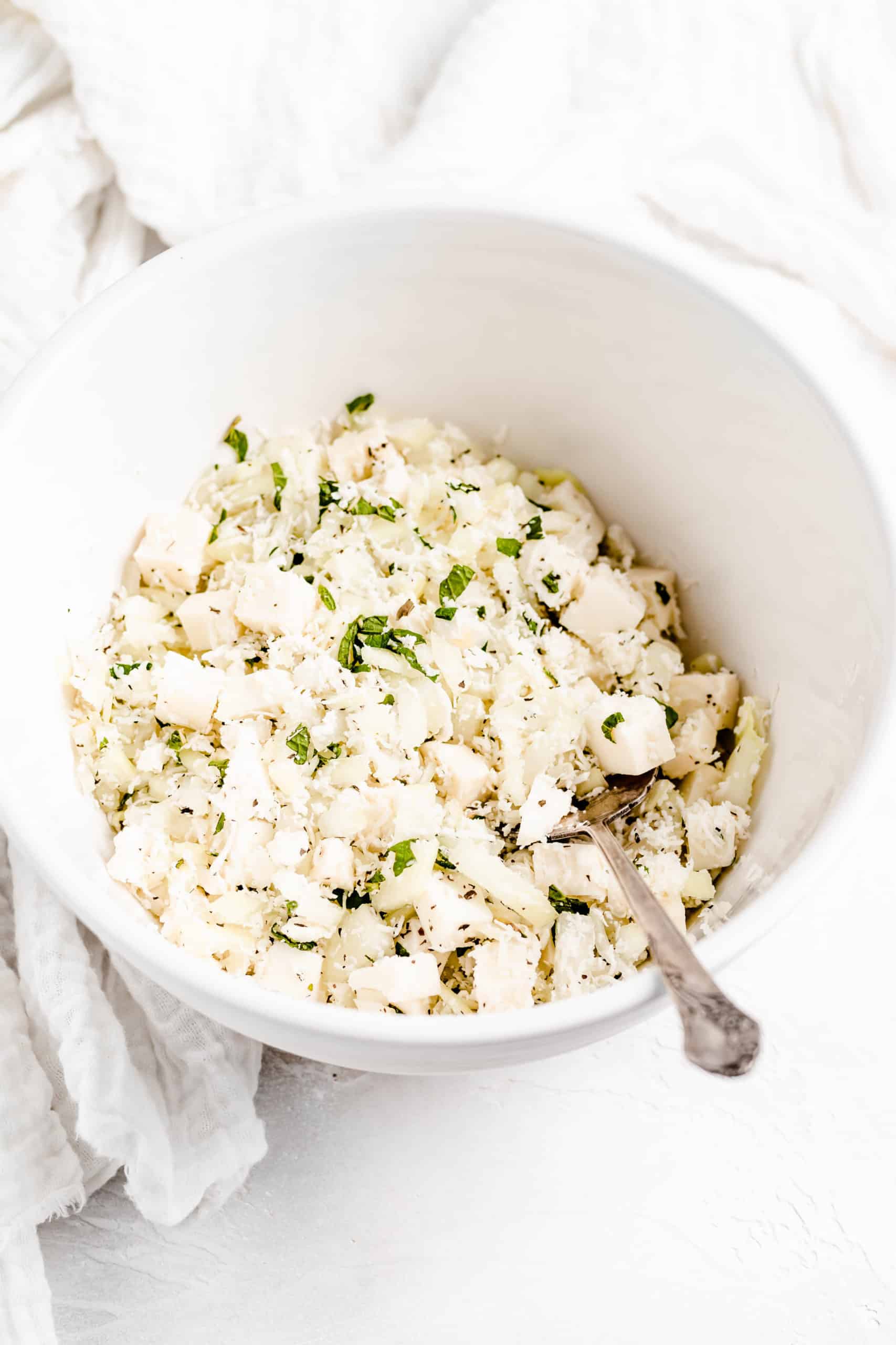 diced halloumi, onion, and mint in a bowl