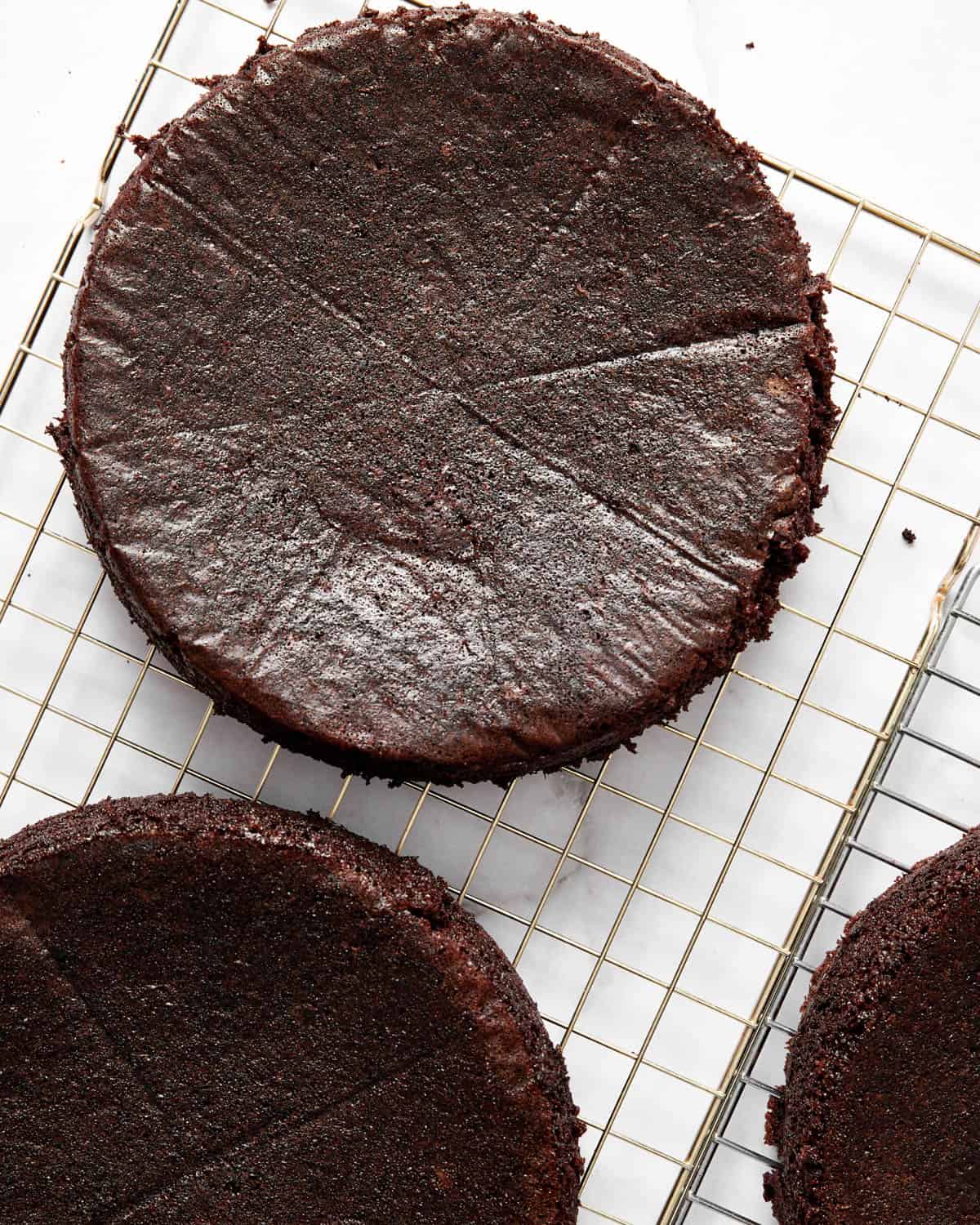 red wine chocolate cake layers on a wire rack.