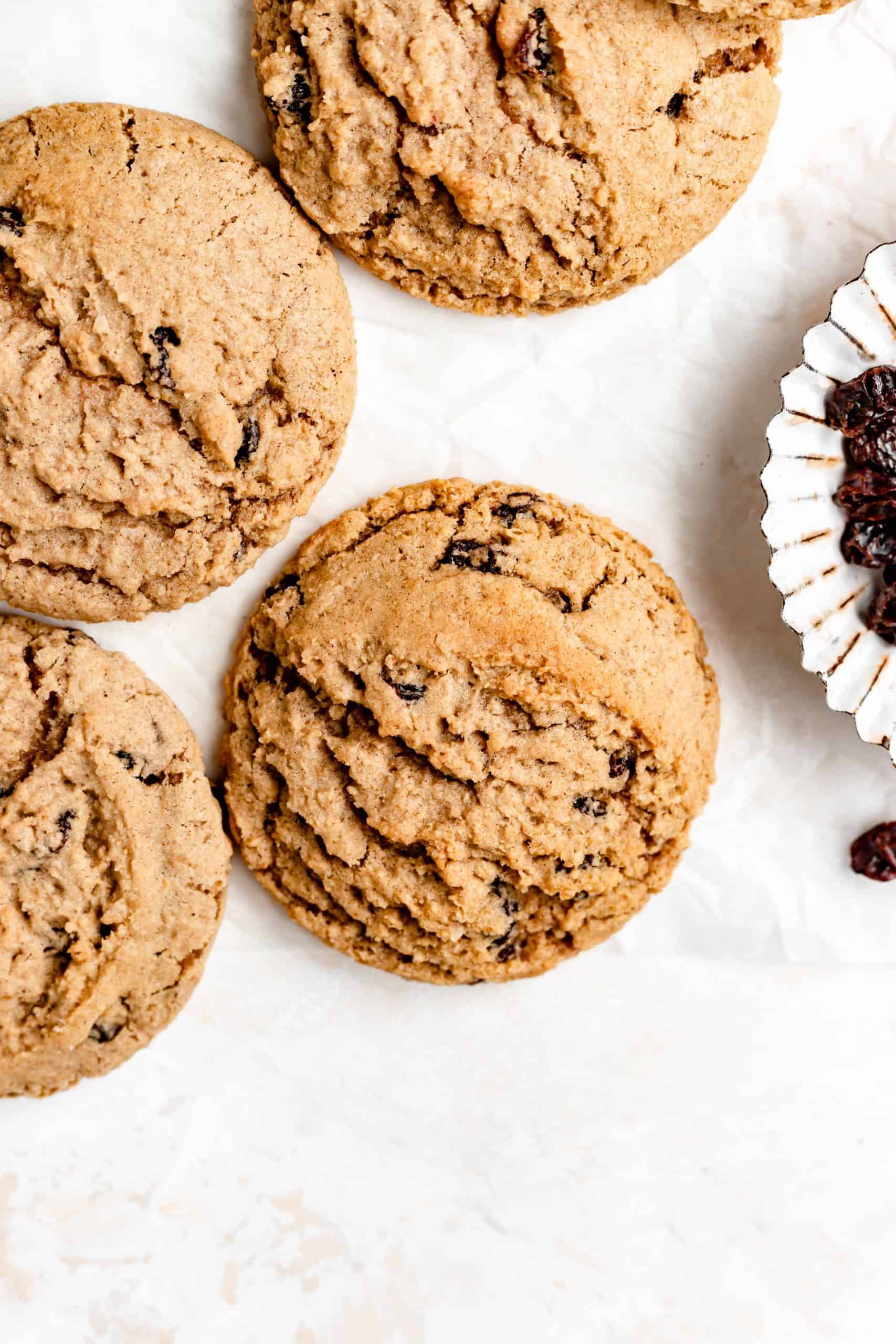 oatmeal raisin cookies on parchment paper