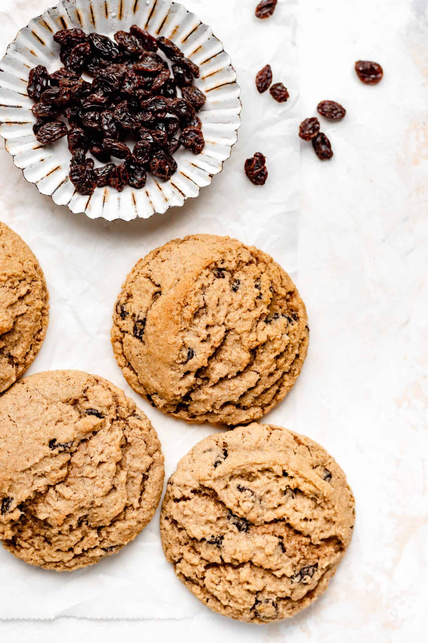 oatmeal raisin cookies on parchment paper