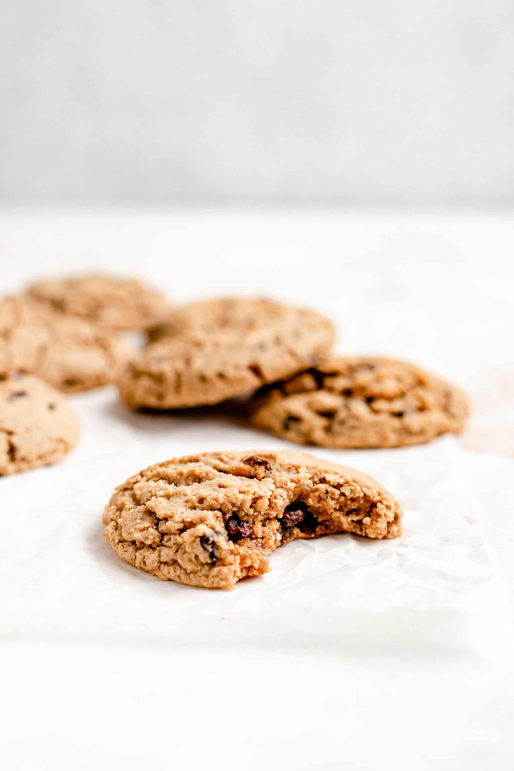 oatmeal raisin cookie with a bite taken out of it