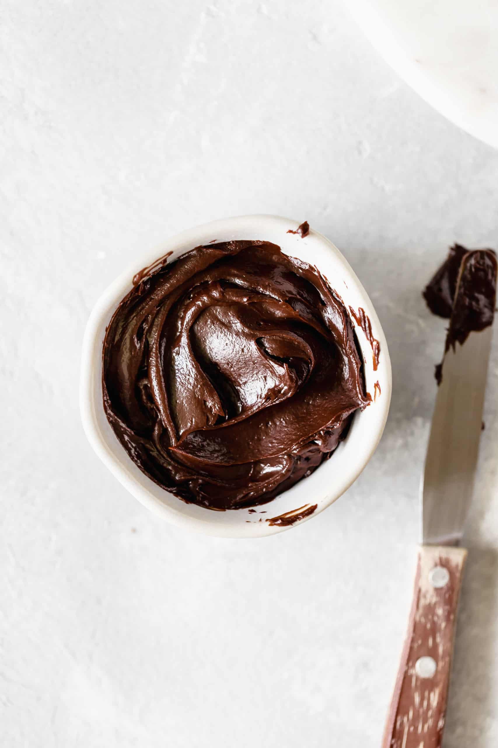 chocolate ganache in a small bowl