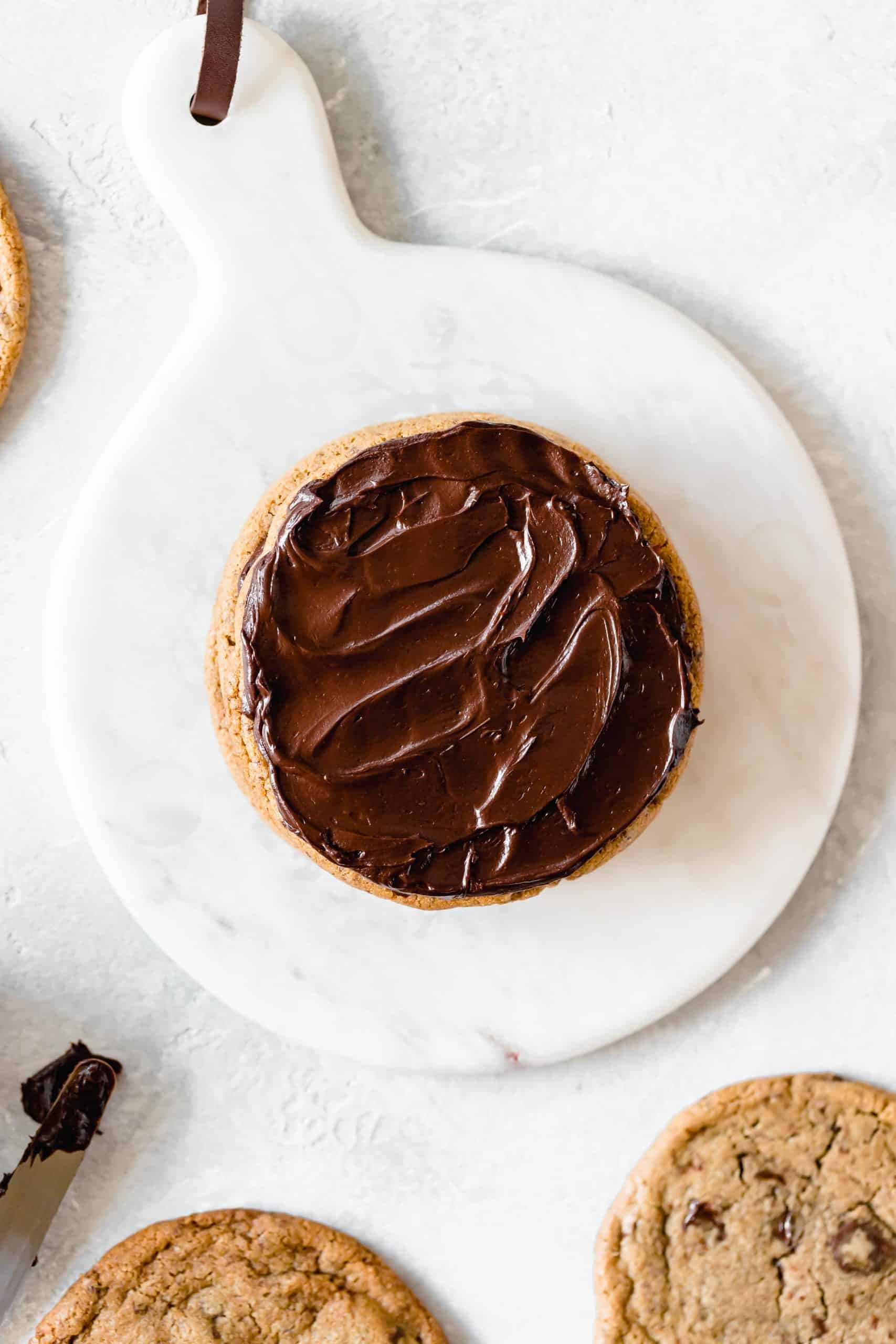 ganache on a chocolate chip cookie