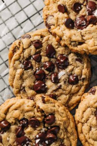 peanut butter oatmeal chocolate chip cookies on a wire rack.