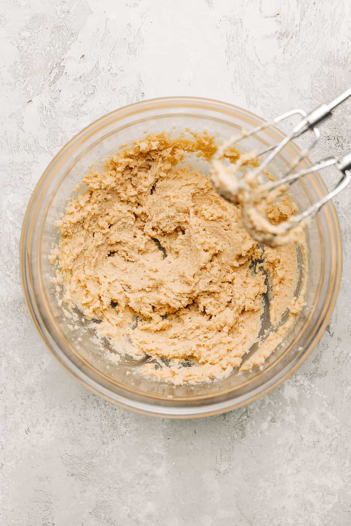 Creamed butter and sugar in a mixing bowl.