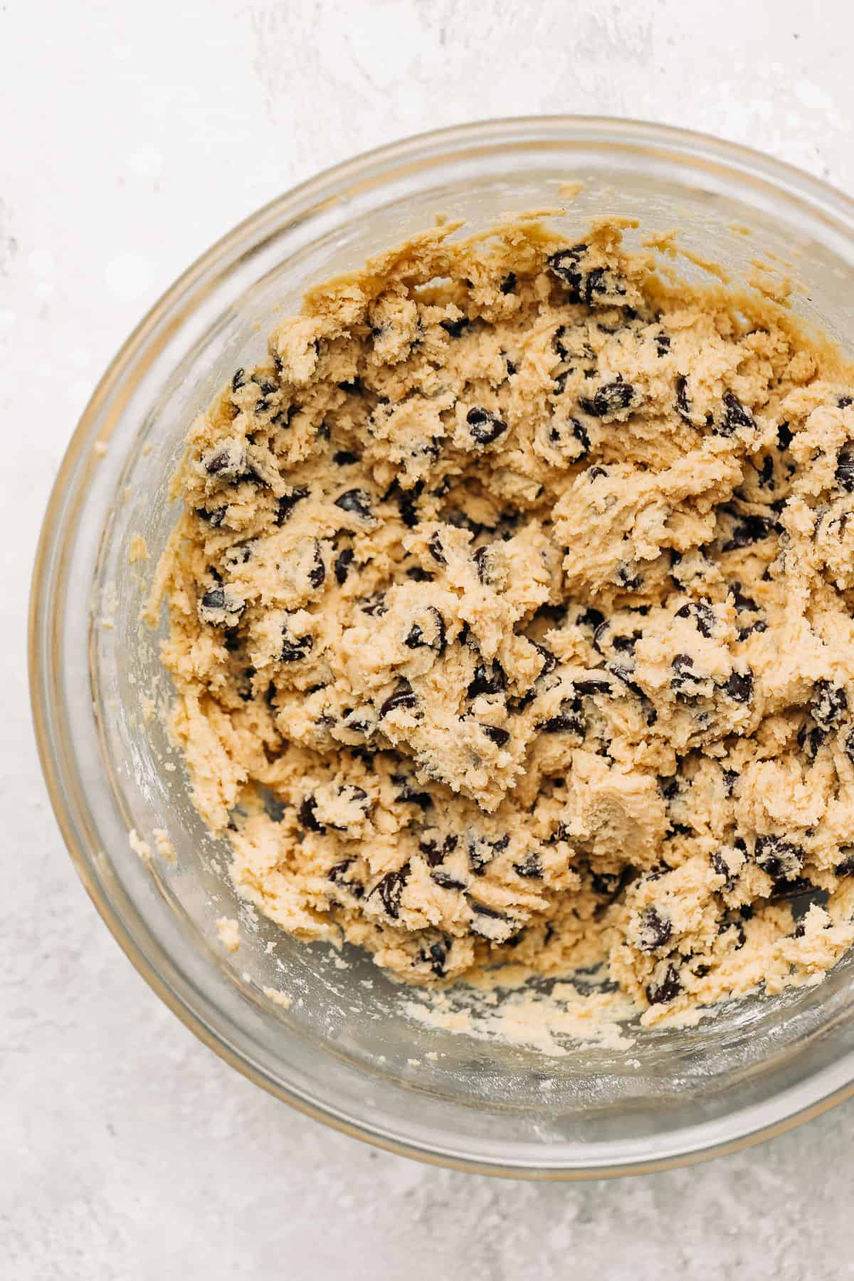 chocolate chip cookie dough in a glass bowl.