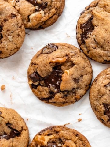 vegan chocolate chip cookies on parchment paper